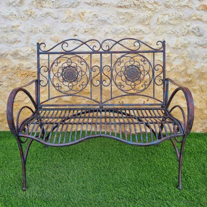 Banc de jardin fer forgé patiné rouille antique confortable vue de face 